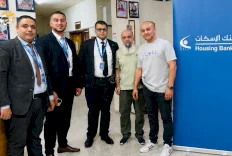 بنك الإسكان يتبرع بأجهزة الكترونية لجمعية بيت المسنين الخيرية في جنين