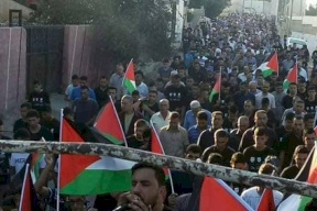 مسيرة باتجاه منازل شهداء دير ابو مشعل الثلاثة