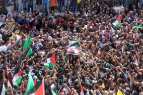 مسيرة مطالبة باسترداد جثامين الشهداء