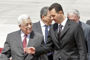 الأسد يعايد الرئيس عباس 