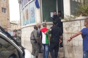 اعتقال شاب في القدس بسبب ارتدائه علم فلسطين