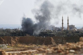  مقتل 18 مدنيا بينهم أطفال بغارة للتحالف في دير الزور