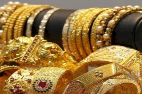 الذهب يتراجع بعد ارتفاع العوائد الأمريكية وقوة الدولار
