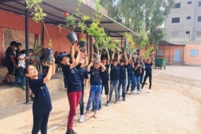 أطفال دير الغصون يزرعون الأشجار المثمرة ضمن مشروع "تخضير الاقتصاد الفلسطيني" 