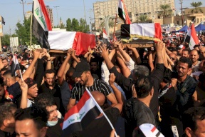 العراق..ملثمون واعتقالات واغتيال