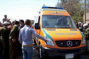 صور: مصري يقتل زوجته في الشارع أمام طفلتيها