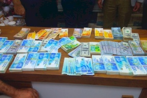 صور: استعادة 645 ألف شيكل سرقت بسطو على شركة صرافة بطولكرم