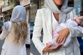 مايا دياب تتجول في الشارع بالحجاب ورضيع بين يديها.. ما السبب! (شاهد)
