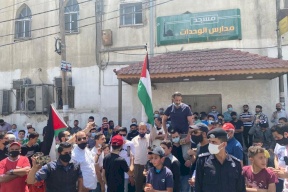 وقفة في مخيم الوحدات بالأردن دعما للأسرى الفلسطينيين