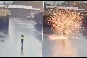 لحظة مرعبة لصاعقة تضرب رجلا في اندونيسيا (فيديو)