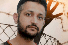 الأسير محمد العارضة يعلق إضرابه المفتوح عن الطعام