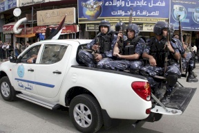 كشف ملابسات جريمة سطو على صاحب محل للصرافة في الخليل