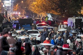 Iran: Policeman Stabbed to Death During Protests in Tehran