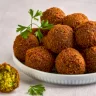 في اليوم العالمي للفلافل.. تعرف على أصل الطعمية المصرية