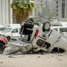 A Projectile From an Iranian Cluster Rocket Falls Near the Israeli Ministry of Security Headquarters in Tel Aviv
