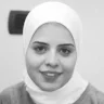 Who is Majdolin Al-Qadi who disappeared with Rania Al-Abbasi in Assad's prisons?