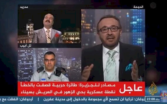 بالصور/ صحفيان بالجزيرة يوبخان فيصل القاسم 