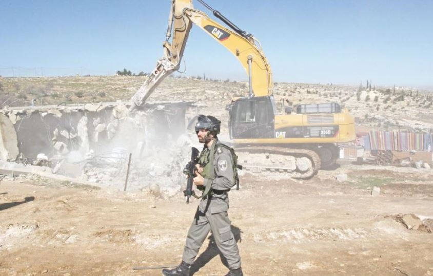 اعتقالات بالضفة وهدم مبنى في القدس وحصار مدرسة في بيت لحم