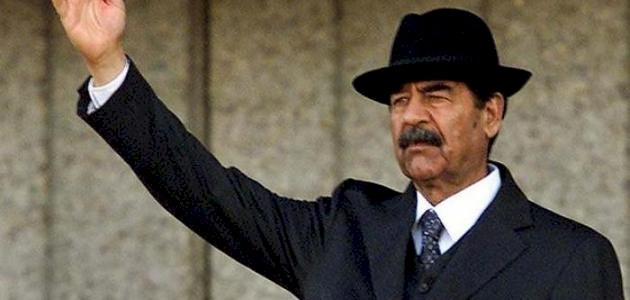 هل يعتبر تمجيد صدام فعلاً جريمة في العراق؟