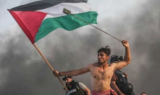 أجمل صورة لعام 2019 لمتظاهر من غزة