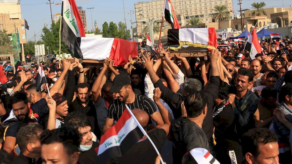 العراق..ملثمون واعتقالات واغتيال