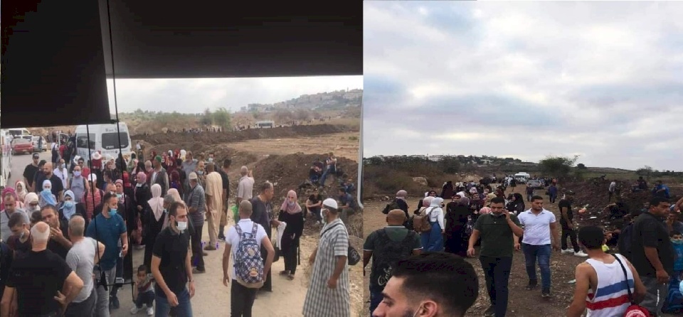 صور وفيديو: آلاف المواطنين يتوجهون الى الداخل المحتل عبر فتحات الجدار بطولكرم