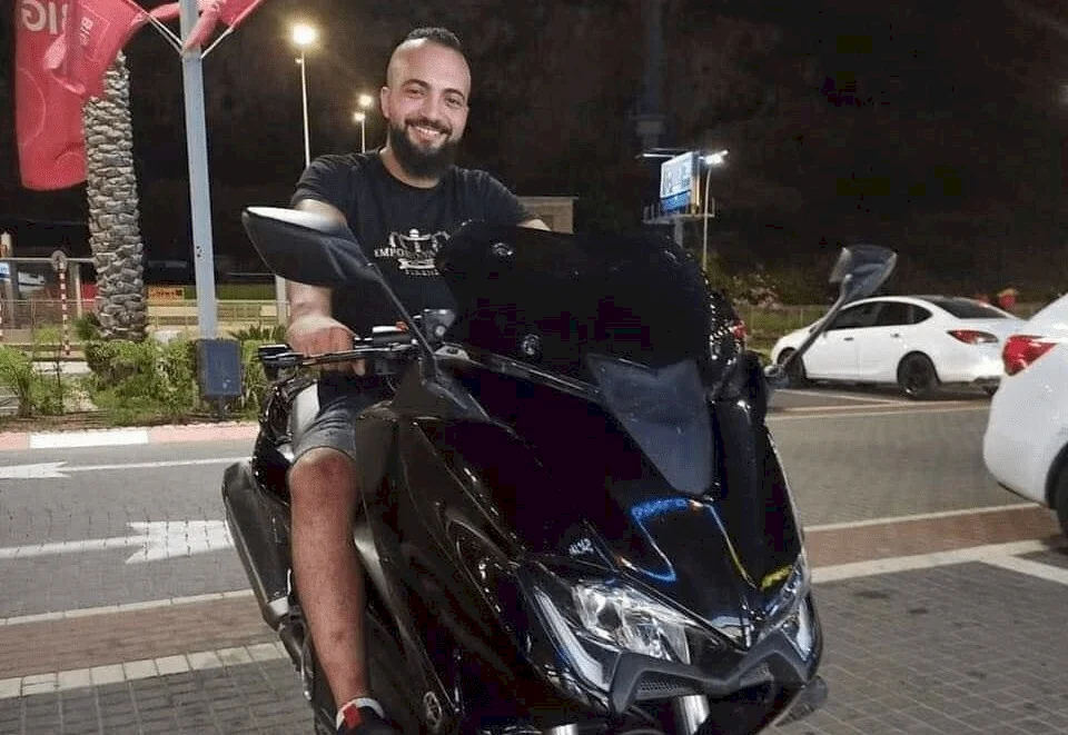 تسليم جثمان الشهيد محمد الشحام
