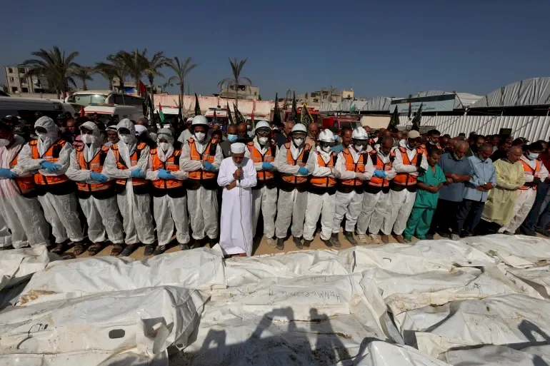 Burial of the Bodies of Dozens of Palestinian Prisoners in a Mass Grave in Deir al-Balah