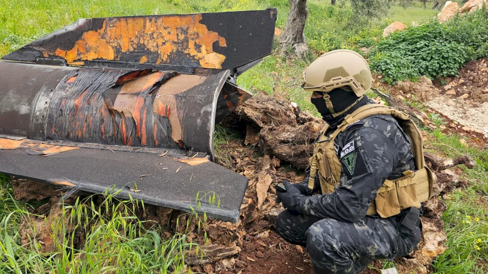 Palestinian Police Deal with Rocket Shrapnel in Tubas