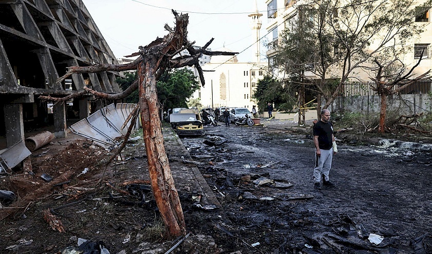 Airstrikes on Beirut and Hezbollah announces targeting of an Israeli warship